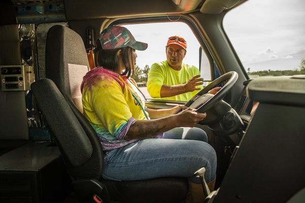 A student driver receives hands-on driving instruction for her CDL at TDI.
