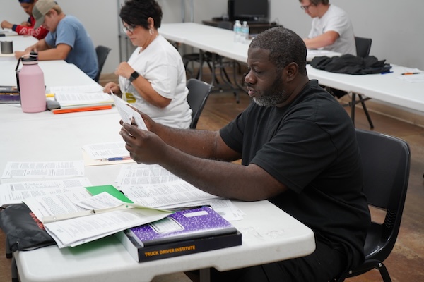 TDI Student Classroom Students in a TDI classroom prepare for the CDL exam.